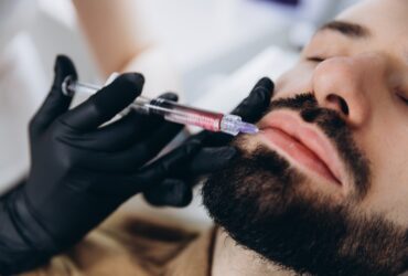 Stylish,Bearded,Man,Visiting,Aesthetic,Clinic,,Getting,Lips,Filler,,Closeup.